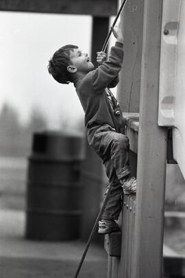 Panarama Elementary School Playground. Westwoodplateau. Curtis Walker, 4, climbing the wall.