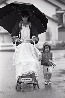 Olson family walking along Glen Drive