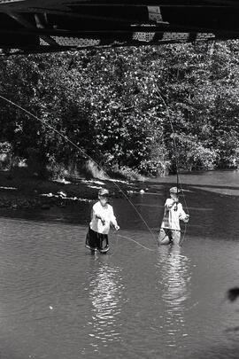 Fly fishers in the Coquitlam River under the Kingsway Bridge
