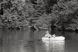Fisherman boating in Buntzen Lake