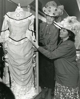 Women in old-timey costumes
