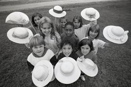 Colleen Mujkwa surrounded by her classmates as she is going to Zimbabwe. Ranch Park Kids Place at 2701 Spurway Ave.