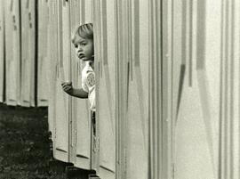 Riley, Ace of Spies. Riley McIntosh, 18 months, disguised as a Port-a-John Coq. Kid Fest '91.