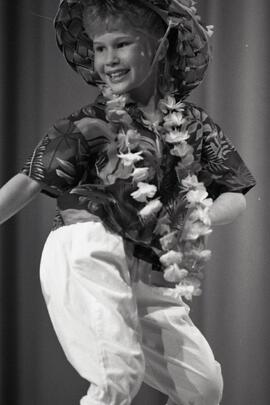 Nicole LaPlaca performing a Hawaiian dance in the finals of the Tri-City Talent Search