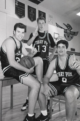 Special section on basketball. Front color and middle of Terry Fox Sr. boys basketball team