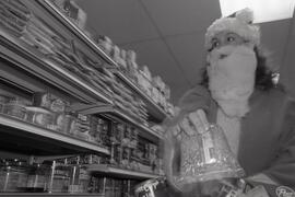 Santa Claus shopping in Maillardville Market to promote Credit Union Christmas food bank drive