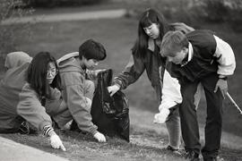 Michelle Wang, C-J Tan, Lena Umezawa, and Brad Letwin help clean up Centennial School at 550 Poirier