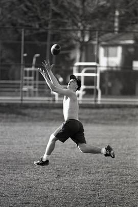 Playing football in Aggie Park