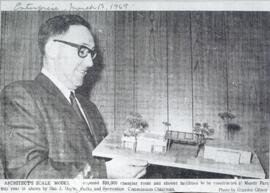Parks and Recreation Commission Chairman Dan J. Doyle with architect's model of shower facilities at Mundy Park