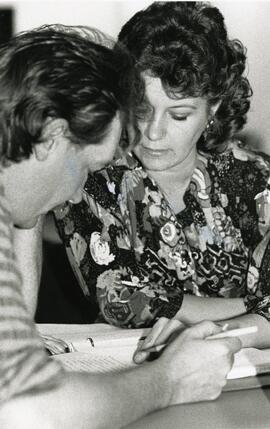 Teacher Judy Crawford with one of her students in a literacy class.