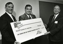 Mayor Lou Sekora and Don Cunnings receiving a cheque