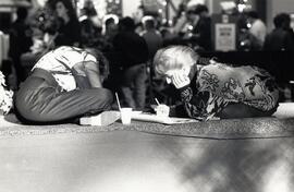 They're doing pay roll for "Reflexions", a store in Coquitlam Centre, Sunday.