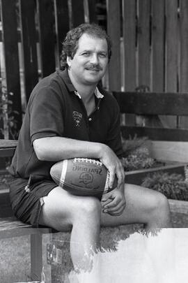 Portrait photo of Alex Szabo for a feature on the football coach of the Trojans