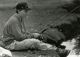 15 year old Shane MacDonald fishes Como Lake on Wednesday Morning