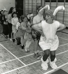 Teacher Carrie Froese leads the primary students at College Park elementary in the bunny hop during a fundraiser for muscular dystrophy.