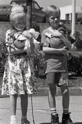 Renee and Jordan Timms with their pet rabbits at the K-Mart Pet Parade in Westwood Mall