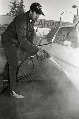 Peter Chand washing an endless line of cars at the Husky Car Wash at Lougheed and Landsdown