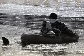 Fisherman break thin ice on Lafarge Lake