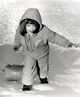 Jenna Ross (3.5 Years old) was having a good time sleding and climbing back up the hill at Port Moody Jr School (she is from Coquitlam)