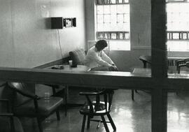 An inmate/patient waits for lunch time on the maximum security 3rd floor.