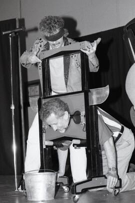 MLA John Cashore gets his head cut off by magician John Kaplan at Como Lake Jr. Sec.