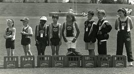 Coquitlam Cheetahs volunteered to carry athlete track suits from start line to finish line