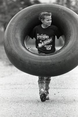 Child in an inner tube in Port Coquitlam