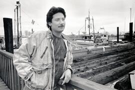 James Petrunice on the dock in front of his house