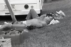 Ron and Bob Miller taking a break next to gas cans at Inlet Park