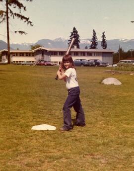 Audrey Champagne playing softball - 1975
