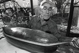 Joseph Melideo has used his magic seeds to grow a 47-pound zucchini in his backyard garden
