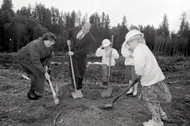 Sod Turning on future site of Coquitlam River Elementary school, Mike Farnworth gets some help from students