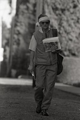 Bill Whitlock Canada Post wearing santa hat on his rounds.