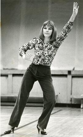 Woman demonstrates dance moves