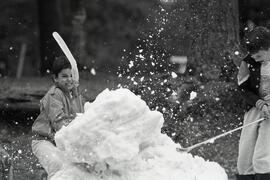 Kids breaking up snow at Coquitlam Sports Centre