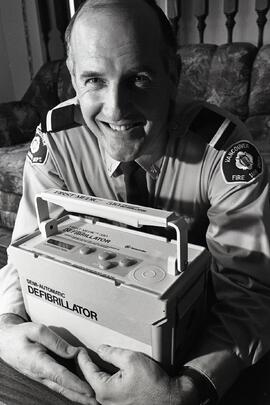 Bill Sanderson is a Coquitlam resident who is Vancouver's Fireman of the Year, for his work in getting the department equipped with defibrillators