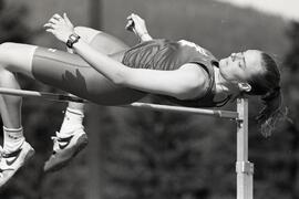 Various sundry athletes compete at SFU invitational track and field meet at Town Centre Stadium.