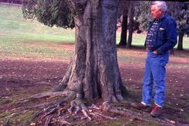 Bill Browne standing by a tree on the Riverview grounds