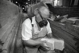 Mike Keller salvaging bricks from the old Crane company's kiln