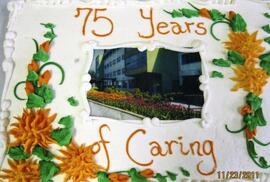 "75 Yearsof Caring" cake