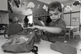 Kids frolic at Panda Bear Daycare, for story about Tri-City daycare needs