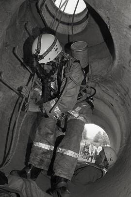 Rescue demonstration inside sewer line by firefighter