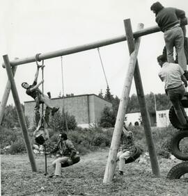 Adults playing on a playground