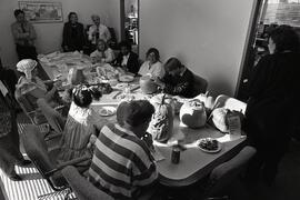 News Staff pumpkin carving and pizza feast in the board room