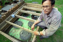 Masa Takahashi and the sewage treatment plant he had built in his own backyard and wishes to sell to others