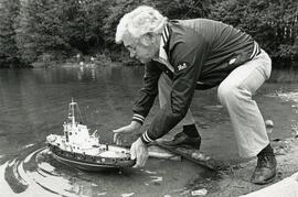 Man with a model ship