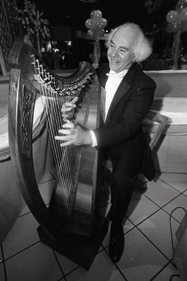 Mike Absalom with Celtic harp at Coquitlam Centre
