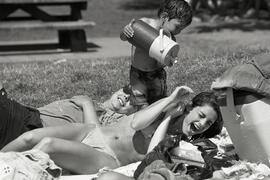 Jeffrey Yanvervelve pouring water on Pauline Yalente at the Blue Mountain Spray Pool