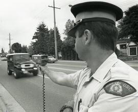 Police officer with radar gun