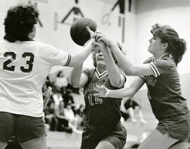 Tannis Gerrord and Chyrstal playing basketball